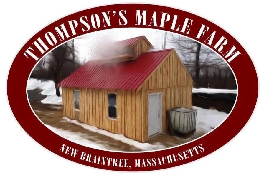 Thompson’s+Maple+Farm+-+IMG_1128 Logo of Thompson's Maple Farm, featuring a wooden sugar shack with a red roof, surrounded by snow and trees, located in New Braintree, Massachusetts.